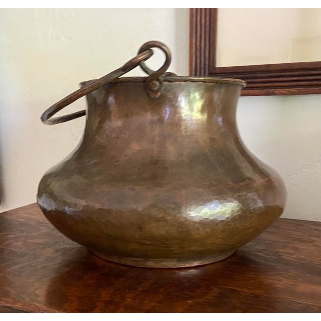 Handsome Arts & Crafts period cauldron with handle.
