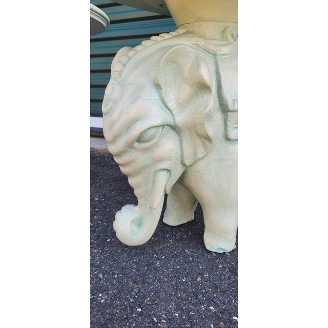 A fine pair of 1950s vintage elephant end tables or side tables. Featuring carved wood bodies and tops whitewashed finish...