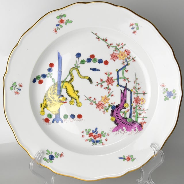A magnificent plate by Meissen having a decorative graphics styled after the 18th century Japanese Kakiemon design of...