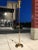 Brass and walnut torchiere floor lamp with large antique style bulb holder and 3-way switch, manner of Gerald Thurston for...