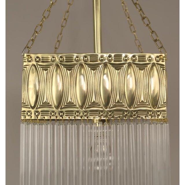 Chandelier made of massive brass. The light provides a pleasant, glare-free light. Polished surface. Up to 250V (Europe/UK...