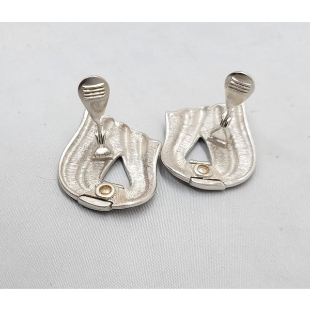 Metal Vintage 1980s Signed Monet Rhodium Plated Modernist Ribbon Clip Earrings - 2 Pieces For Sale - Image 7 of 8