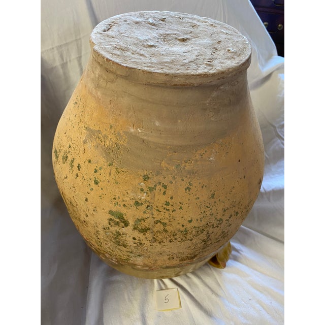 Confit jars were used in the south of France for preserving meats such as duck or goose. The bottoms were not glazed, as...