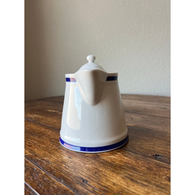 Williams Sonoma Brasserie Pattern Creamer Made in Japan Porcelain 5” width, 4” depth and 4.75” height No Chips nor cracks....