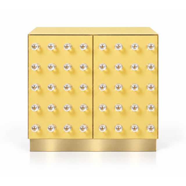 This contemporary italian storage cabinet combines a butter-yellow murano glass finish with 90 clear glass spheres and...