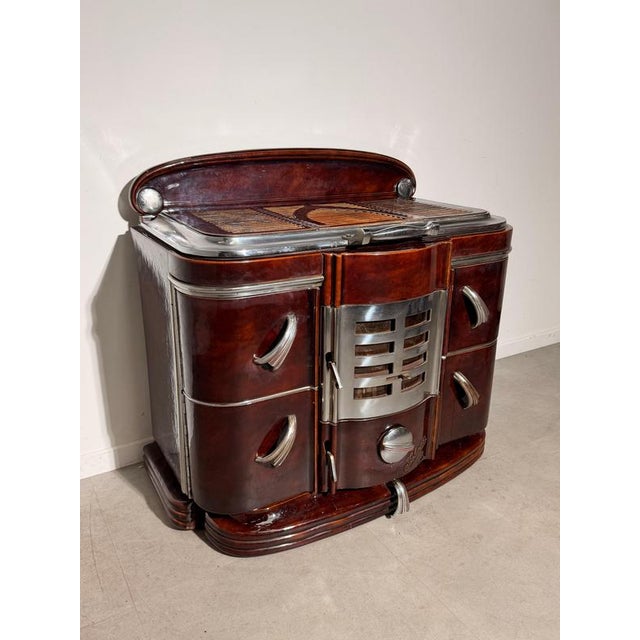 A spectacular fobrux no. 4839 stove , showcasing the bold streamlined aesthetic of the art deco / machine age period....