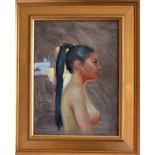 This oil on panel artwork portrays a figure in profile, capturing a serene moment with a focus on the subject's graceful...