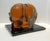 Bernard Pfreim, "The Kiss", Amber Acrylic Sculpture, having silvered resin hands, resting on a black acrylic base.