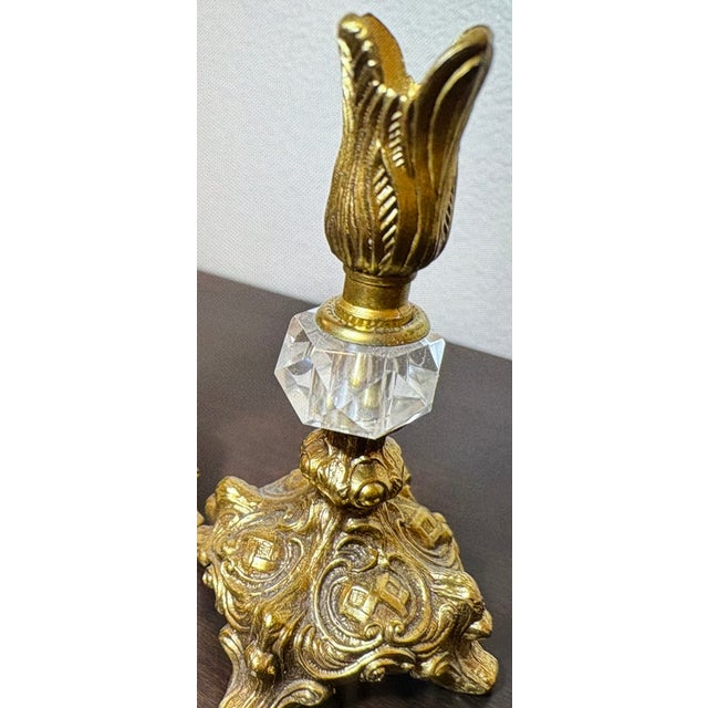 These candlesticks have CVG stamped on the bottom of them, likely the artisians mark but it is unknown and I have asked...