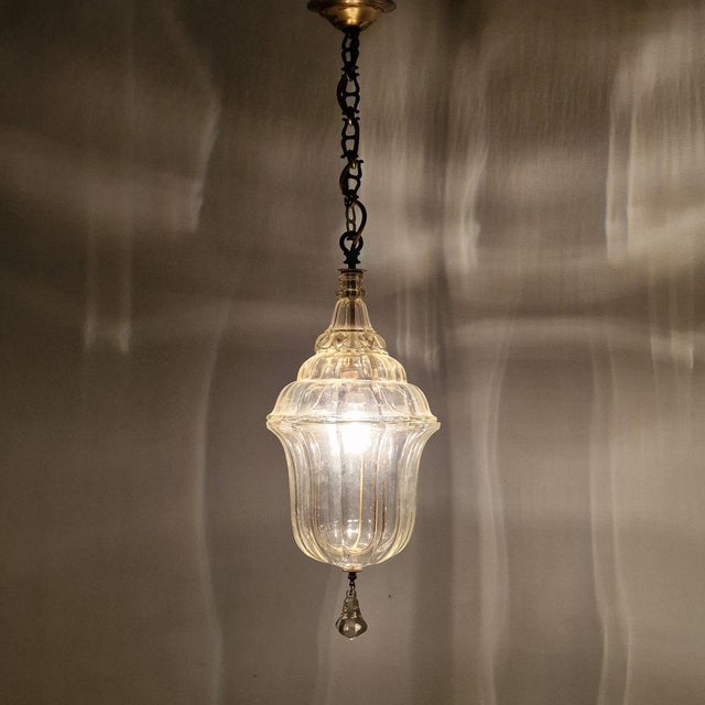 Very charming lantern made around 1900 in Italy. It is made of beautiful cut crystal glass with brass details. The lamp is...