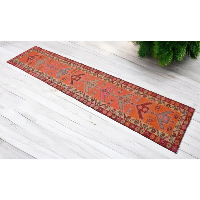 Vintage Turkish runner is from the Kurdish region. This extra perfect piece is about 50-60 years old. Size: 2’9” x 12’6”...