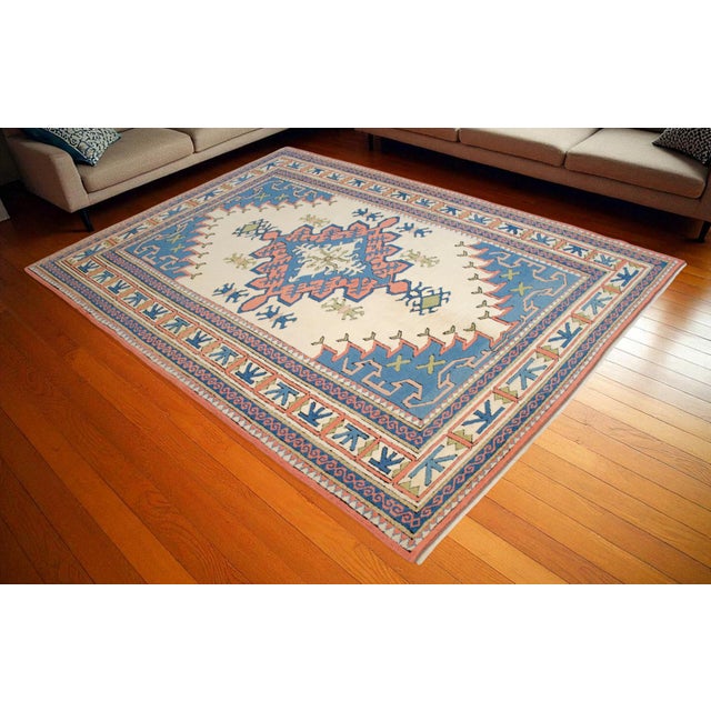 This remarkable vintage Turkish Anatolian rug is a true statement piece, perfect for the discerning collector. Hand-...