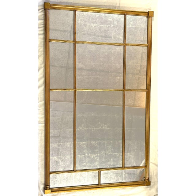 Wonderful large Bernhardt mirror from the late 20th century. The mirror has an architectural salvage appearance with a...