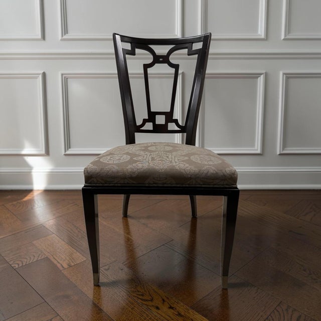 Stunning set of dining chairs by famed designer and architect Lucien Rollin masterfully recreated by William Switzer....