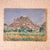 20th Century French Hilltop Church Painting by Guy Lemm, depicting a sunlit village nestled beneath a hillside church with...