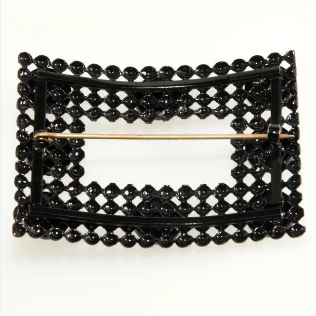 Victorian sash pin embellished with black faceted glass and cold paint enameling. This type of piece simulates Vauxhall...