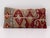 Handcrafted lumbar pillow made from a vintage handwoven Turkish kilim, featuring rich tones of burgundy, ivory, taupe,...