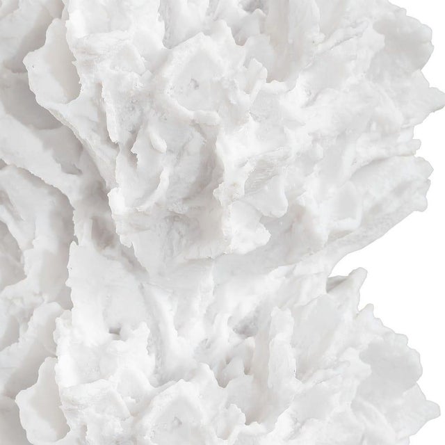 Bring an organic coastal element to your space with this sculptural table lamp, featuring a striking white faux coral...