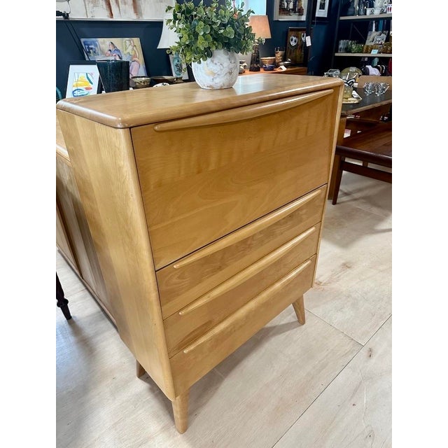 This Heywood-Wakefield M389W Secretary Desk, also known as a desk/chest combo, features solid birch construction and...