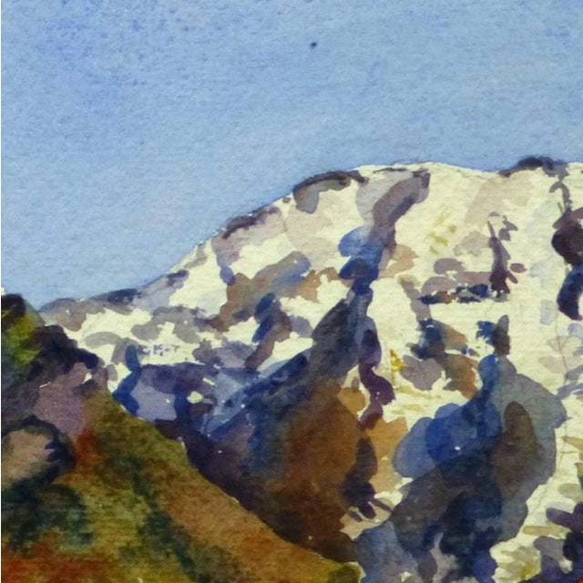 Two snow-capped mountains meet under a clear blue sky in this vivid French watercolor, circa 1930. Original artwork on...
