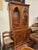 Antique Secretary Bookcase has a lovely dropdown cubby. Two-piece design for easy transport. Damage to the wood lace on...
