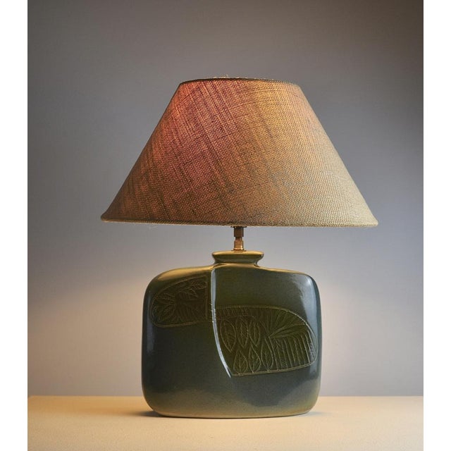 Elegant glazed ceramic table lamp by D. Protion, produced in Vallauris, France, during the 1970s. The softly rounded...