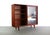 Substantially built display with glass front and movable shelves. Contoured pulls in solid sculpted teak and wonderfully...