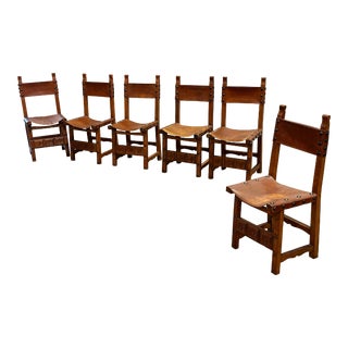 1960s Vintage Spanish Revival Carved Oak + Leather Dining Chairs - Set of Six For Sale