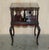 We are delighted to offer for sale this very well made English mahogany circa 1880-1900 Aesthetic Movement revolving...