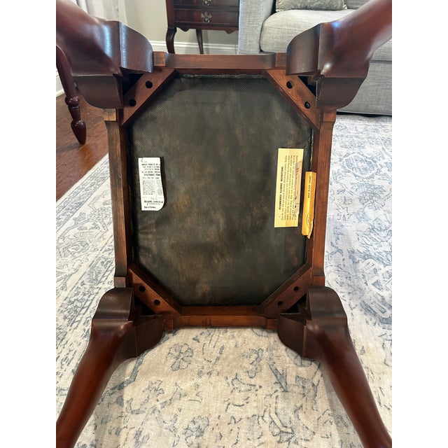 Beautiful vintage Henkel Harris upholstered ottoman/footstool featuring the timeless traditional craftsmanship the brand...
