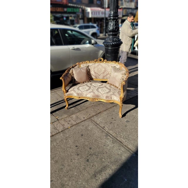 This elegant Vintage Settee would be a wonderful addition to any space. Although small in stature, the delicate details on...