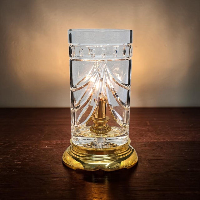 This Waterford Crystal Overture hurricane table lamp was produced in Ireland during the Late 20th Century. Crafted of...