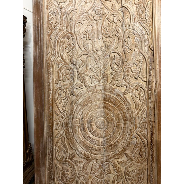 A striking statement piece for any entryway, hallway, or interior threshold. This solid wood sliding barn door features an...