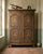 Beautiful rustic French Louis XV style armoire, decorated with four stars with inlays from different types of wood, early...