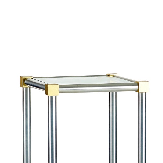 Aluminum and brass side table with glass insert on top in the style of John Vesey or Maison Jansen Circa 1970s Measures...