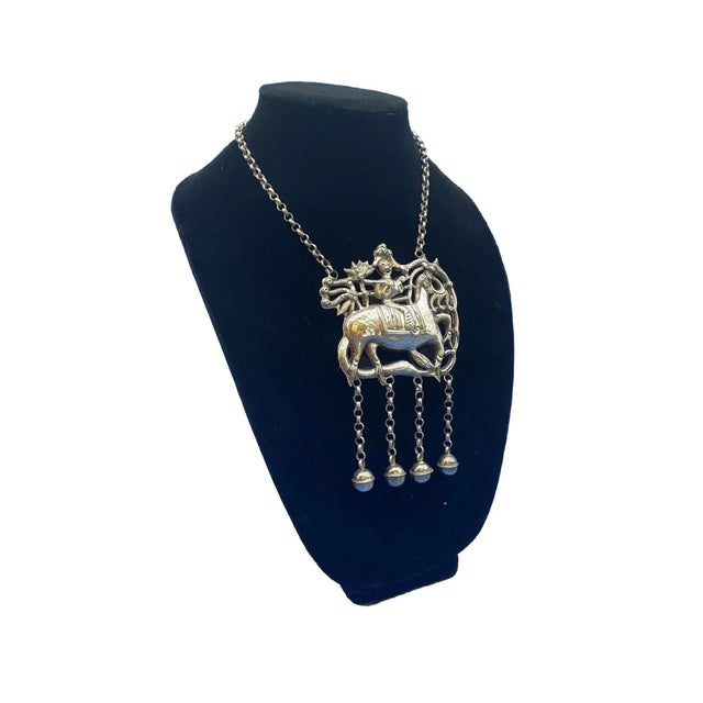 Very unique antique Chinese silver pendant necklace with a boy riding a Qilin, a mythical creature symbolizing good...