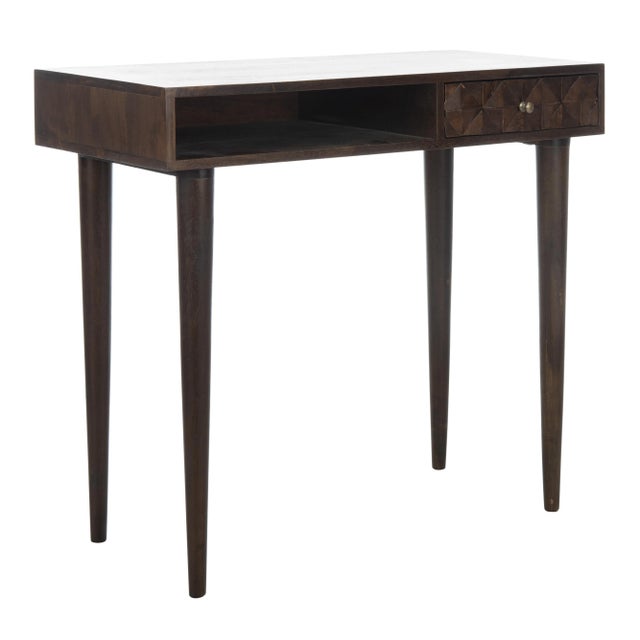 Inspired by bespoke furnishings at London’s foremost decorative arts show, this contemporary desk is a modern heirloom....