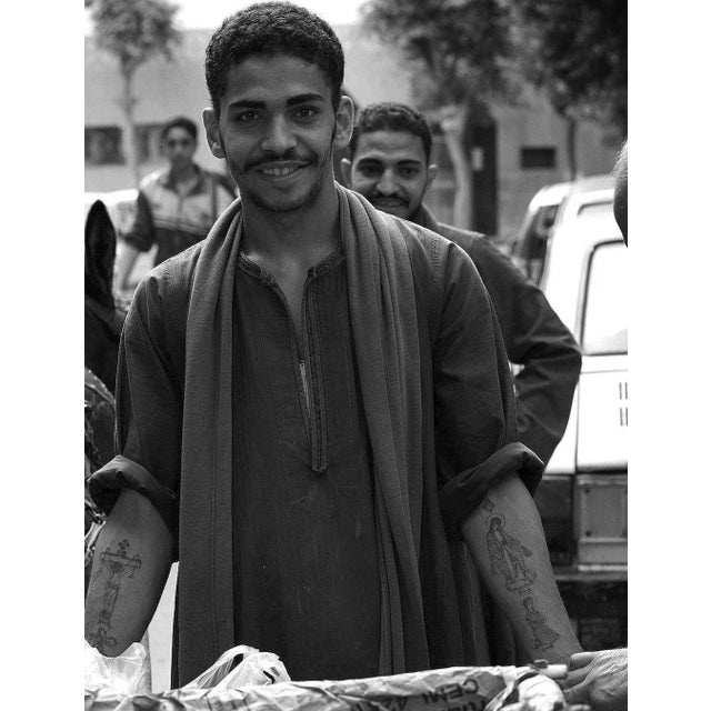 Copts 07- signed limited edition archival pigment print, 2012 - edition of 5 man in a market, cairo, egypt. In assignment...