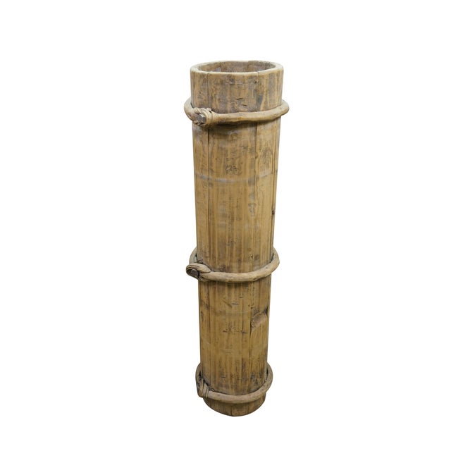 Three Antique Tibetan butter churns (butter barrels / milk buckets) made from wood and bound with willow or wooden bands....