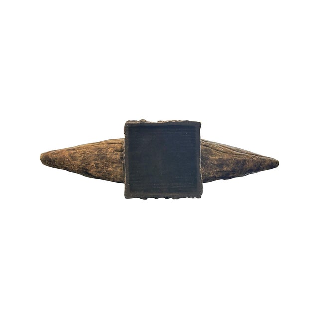 This sculptural vase brings a grounded, organic presence to any space. Crafted with a weathered stone-like finish, its...