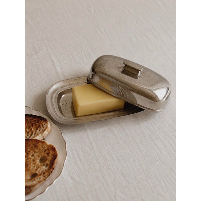 A handsome Reed & Barton silver plate covered butter dish in the classic Embassy pattern, model #1142 — marked clearly on...