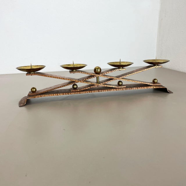 This original vintage candleholder, was designed and produced in the 1950s in Austria. It is made of solid copper and...