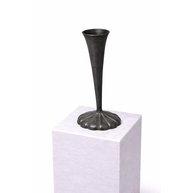 A striking and sculptural Art Deco pewter vase designed by Just Andersen in Denmark, circa 1930s. This elegant piece...