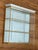 Vintage Franklin Mint wall display shelf in a gold finish with a mirrored back and three glass shelves. A handsome...