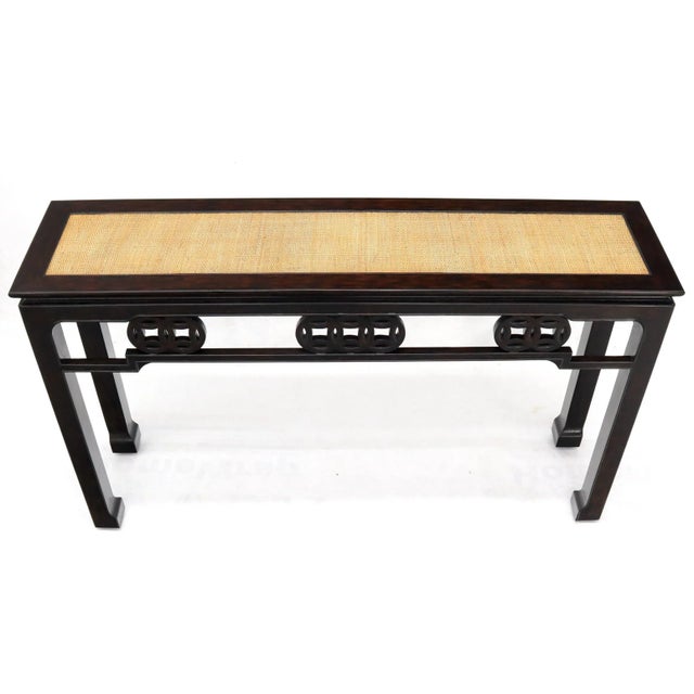Oriental Asian midcentury style carved base high quality craftsmanship console table with caned top.