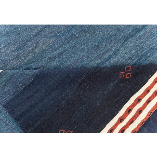Contemporary blue Kilim rug by Doris Leslie Blau Size: 10'0" × 14'0" (304 × 426 cm). A handmade flat-weave wool rug. The...