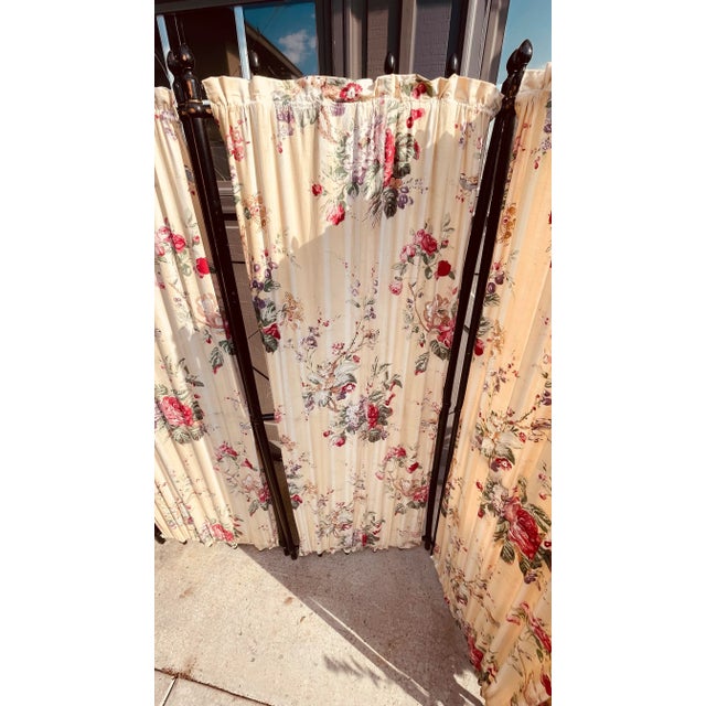 Beautiful done with wood frame appointments and floral vintage fabric.