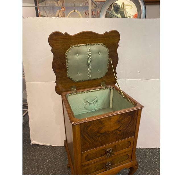 Antique mid 19th Century flame walnut sewing or work table. The highly figurative wood top, that lifts up to reveal a...