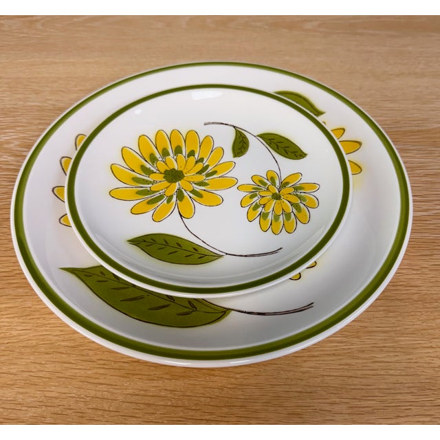 A complete 12-place setting set of vintage Mikasa "Tampa" pattern stoneware, produced in the 1970s. Each setting includes...