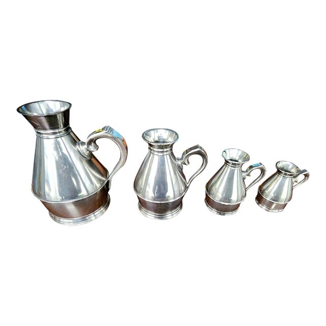 Set of Four Early 20th Century Fine English Polished Pewter Graduated Measuring Jugs For Sale